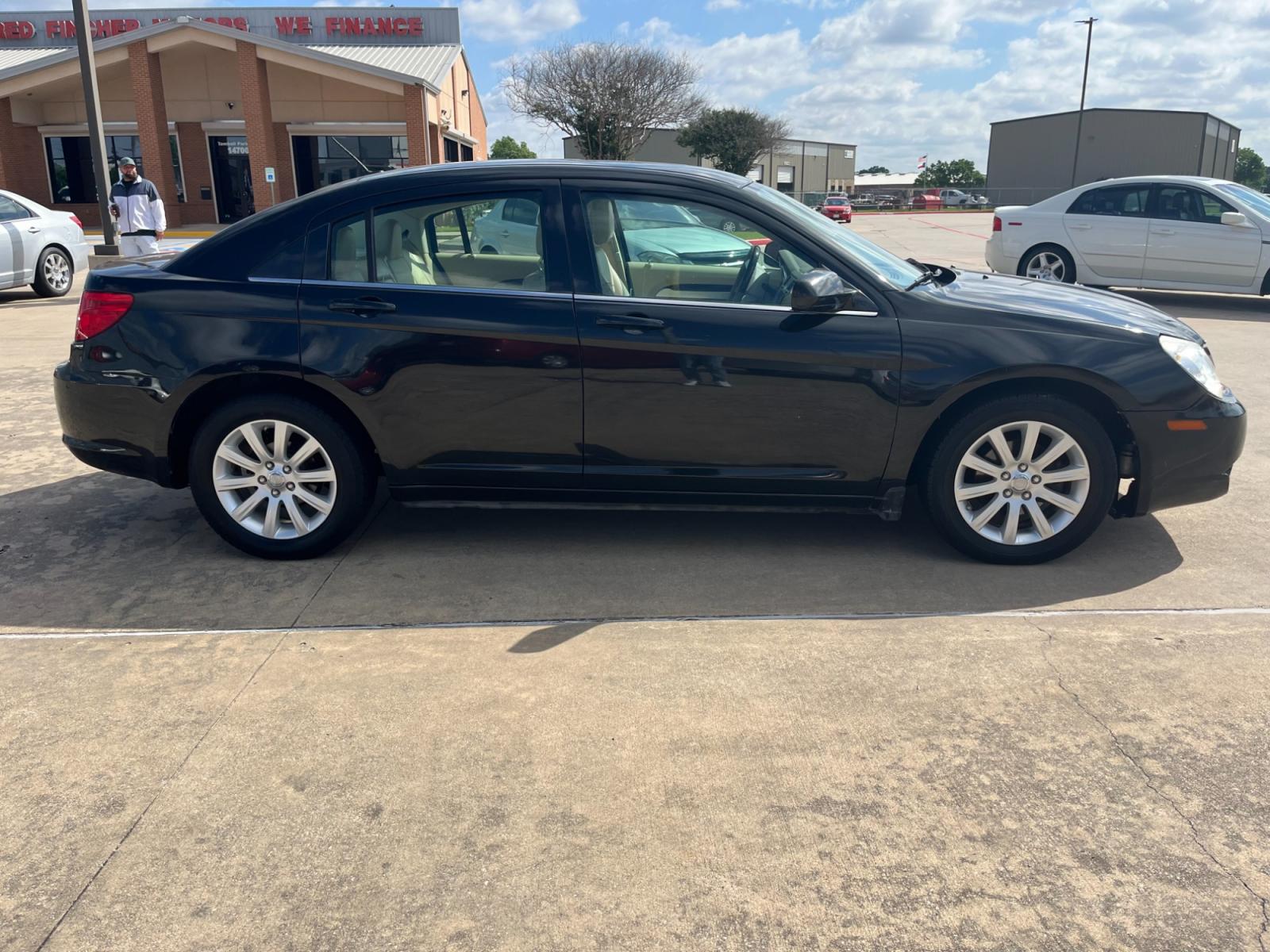 2010 Black /TAN Chrysler Sebring Sedan Limited (1C3CC5FB2AN) with an 2.4L L4 DOHC 16V engine, 4-Speed Automatic transmission, located at 14700 Tomball Parkway 249, Houston, TX, 77086, (281) 444-2200, 29.928619, -95.504074 - Photo #7